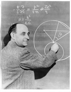 Enrico Fermi, 1938 Nobel Prize winner in physics, at a chalkboard