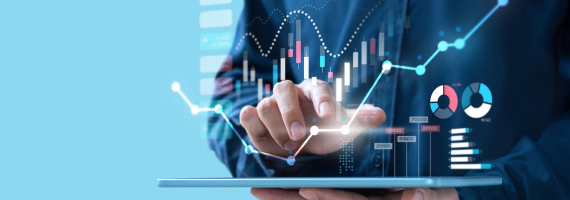 Businessman trading online stock market on teblet screen, digital investment concept Management Consultant looks at graphs on a tablet.