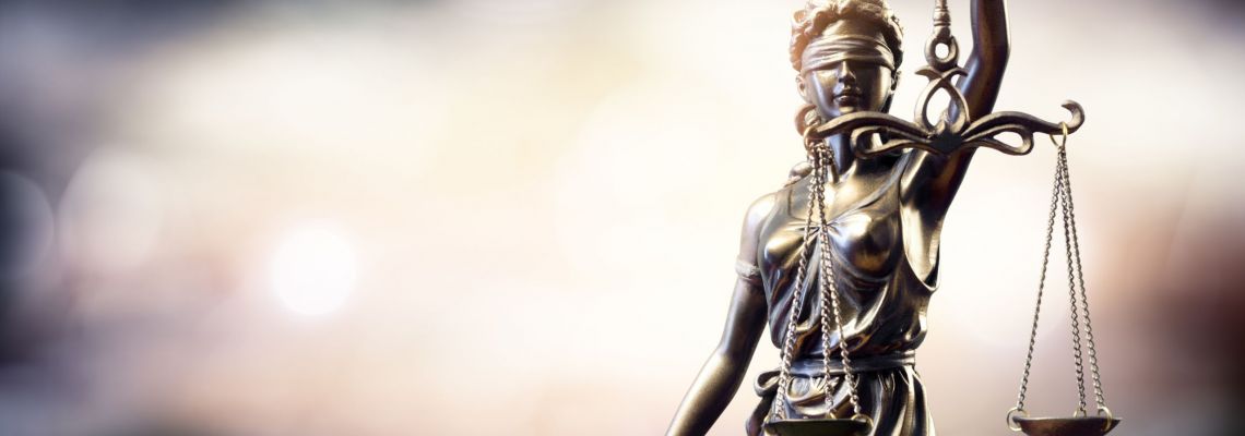 Statue Of Lady Justice Statue of Lady Justice symbolizes what a student learns in a master's in criminal justice degree program.