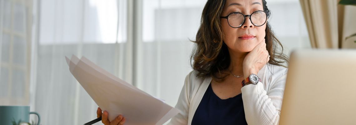 Business Technology Degree Jobs, Concentrated asian middle aged female businesswoman using portable computer Business Technology Degree Jobs