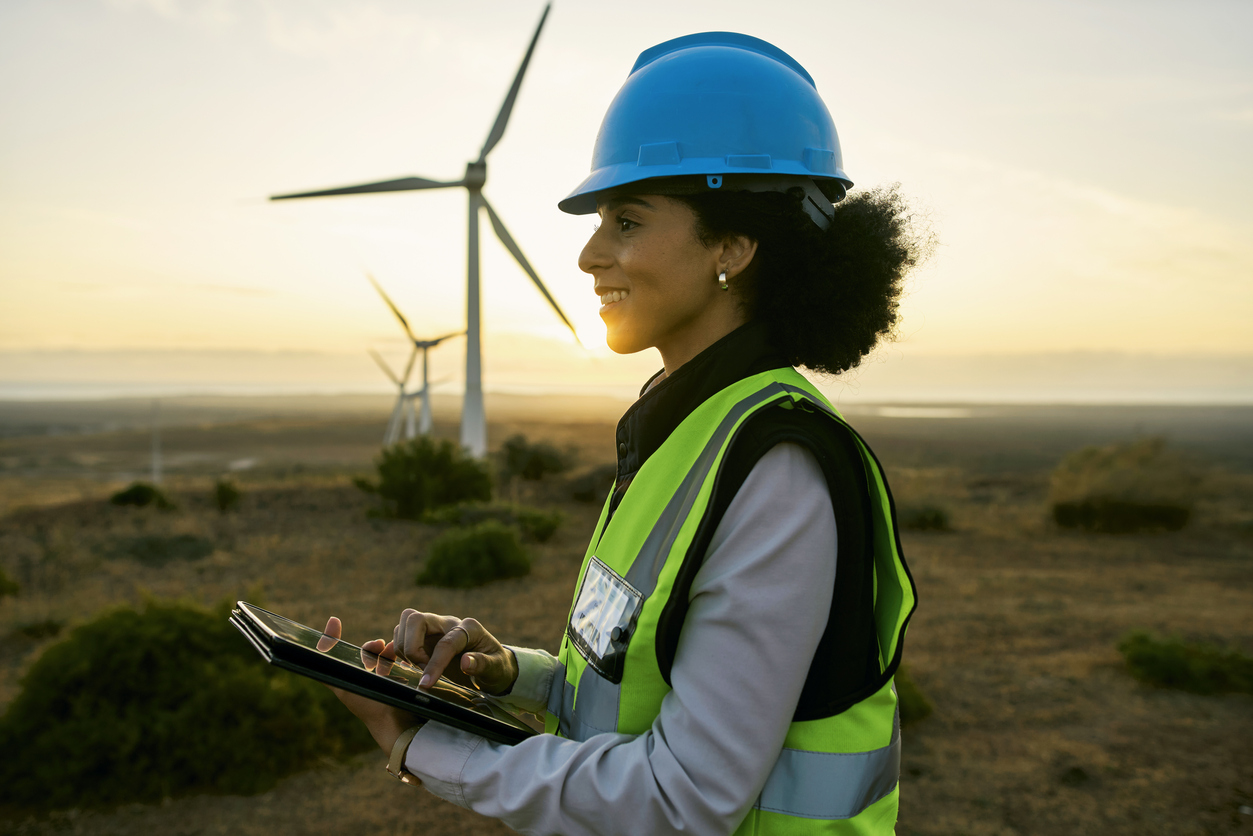 A master's in sustainability online graduate works in the renewable energy sector.