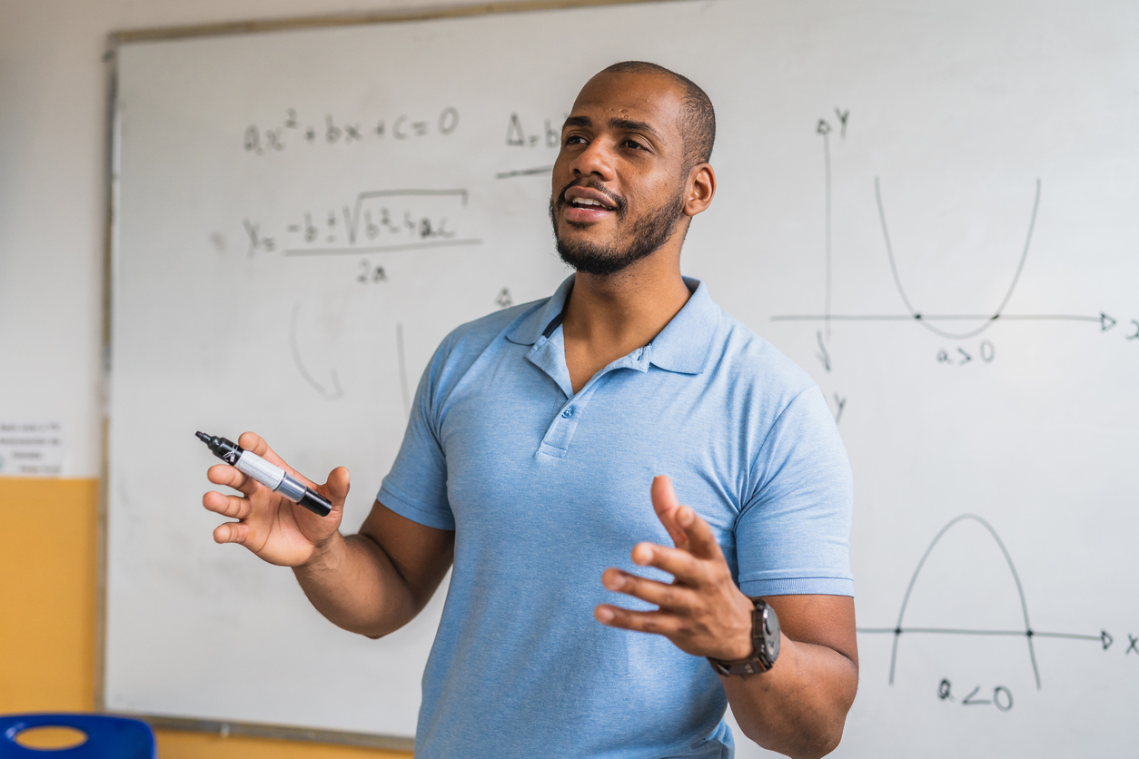 An online master's in mathematics graduate teaches students.