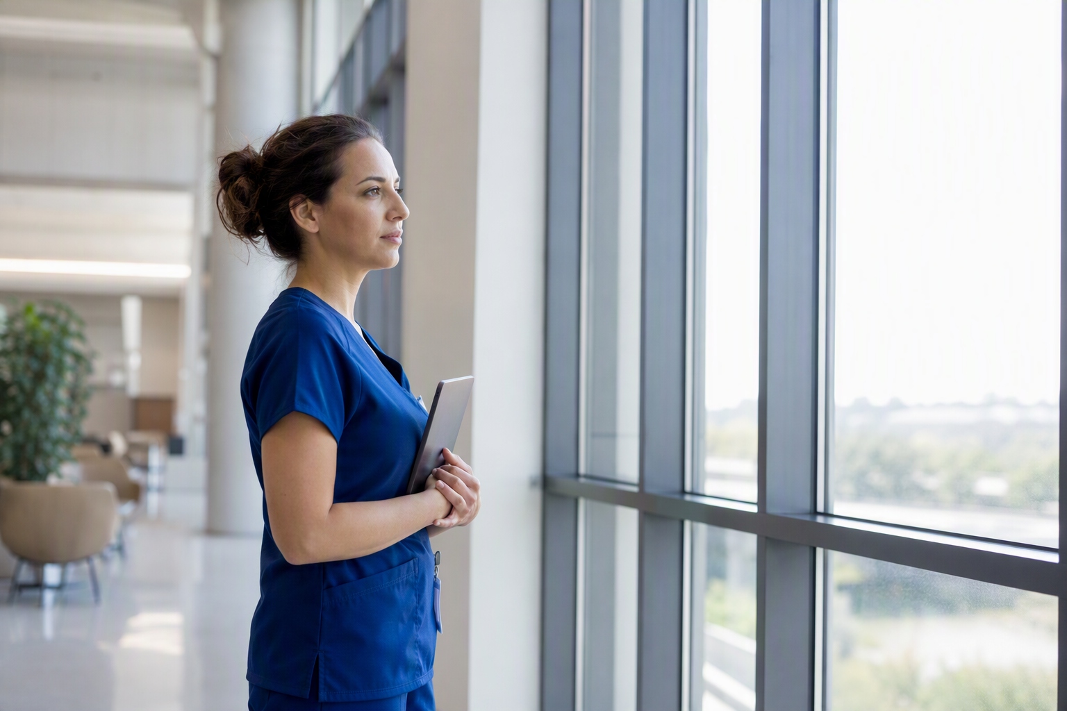 A student reviewing transcripts and planning transfer credits for an online nursing administration master's program