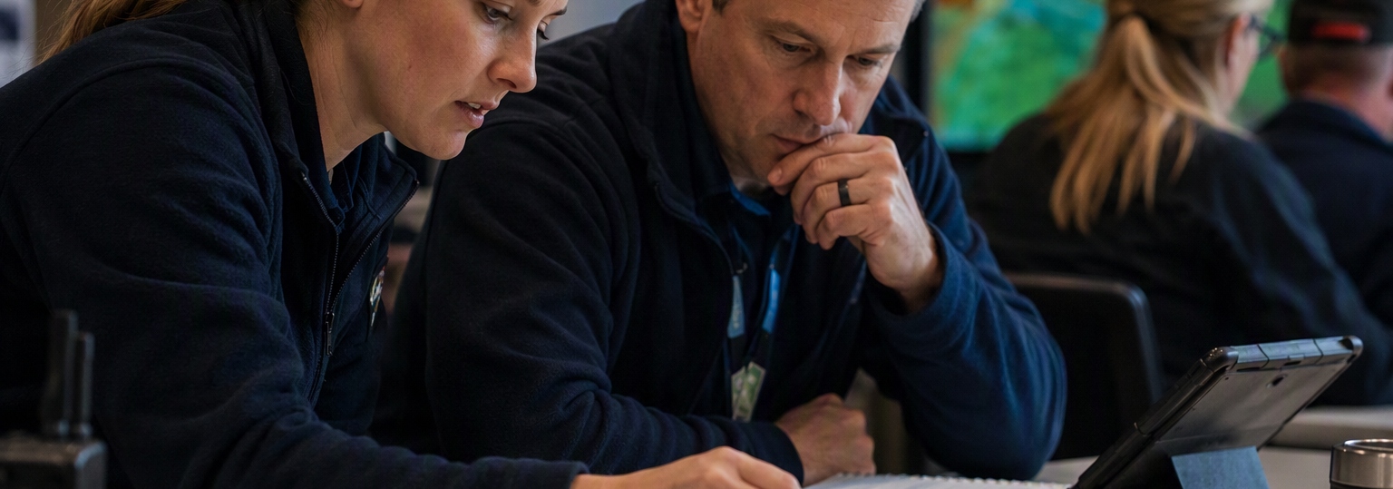 Group discussion among adults in a study setting about homeland security master's career paths