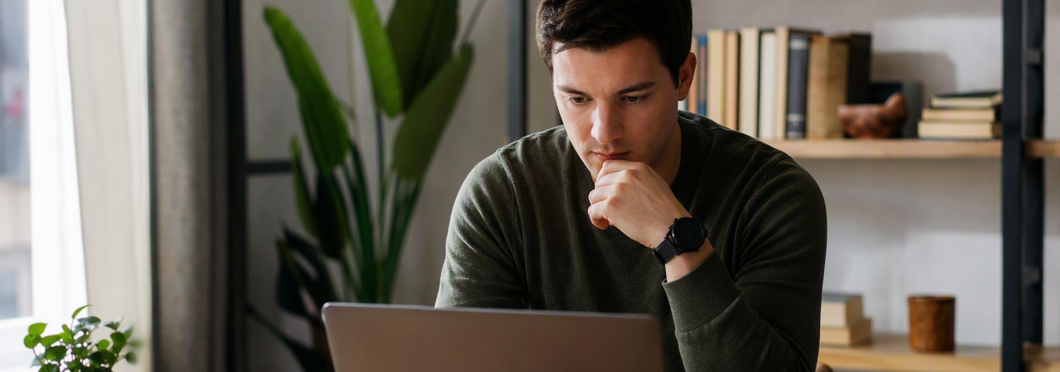 Two adults discussing education options for an online information technology bachelor's degree
